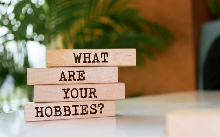 Wooden blocks with words 'What Are Your Hobbies?'.