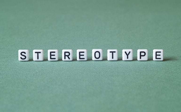 Stereotype - word concept on cubes, text, letters