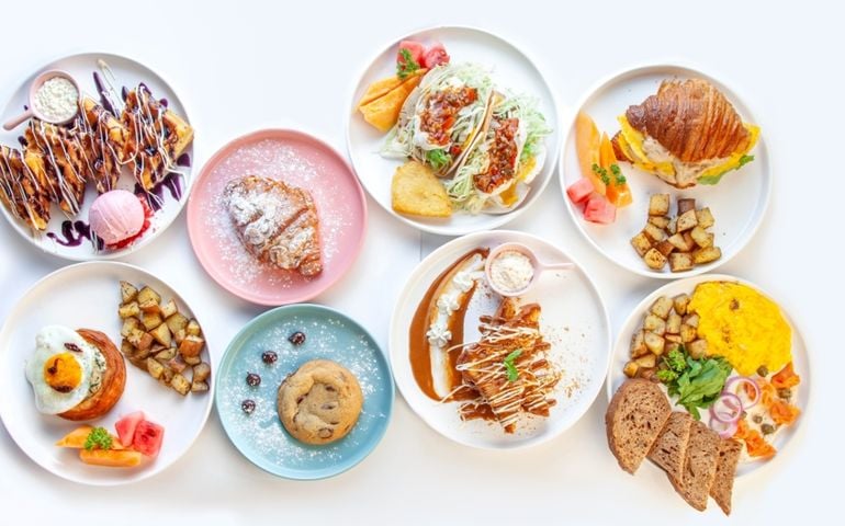 Fancy Breakfast table top angle with variety of dishes.