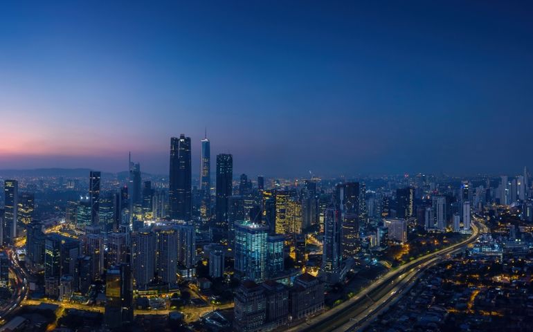 Aerial view of peaceful cityscape before sunrise