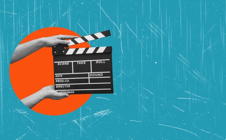 Hands holding clapper board making video cinema in studio. Movie production clapper board. Action, theatre day