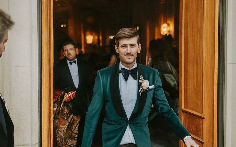 person walking through a door to an event