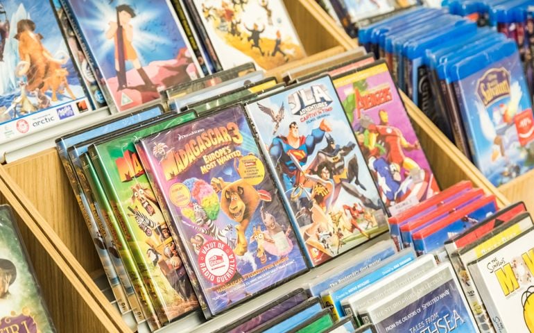 BUCHAREST, ROMANIA - MARCH 22, 2015: Children Animated Movies On DVD For Sale On Library Shelf.