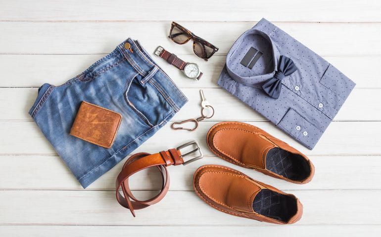 Flat lay, Men's fashion casual outfits and accessories with space on white wooden background