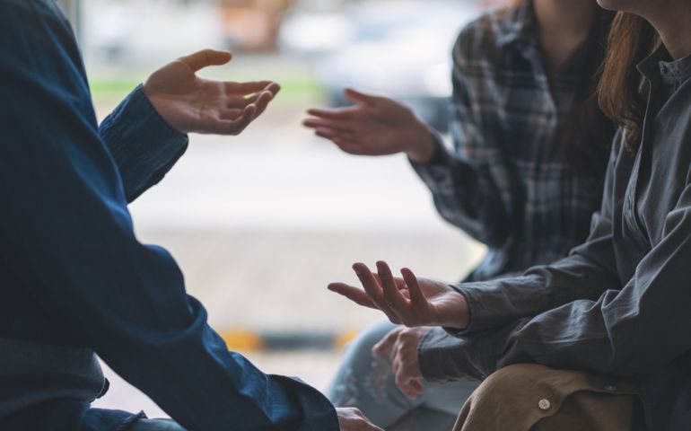 People sitting and talking together