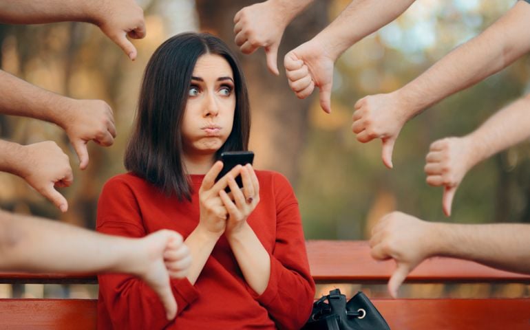 Woman Getting Negative Reactions on Social Media Post.
