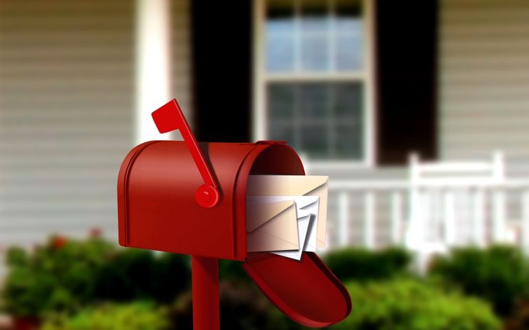 Mail Box In front of a House