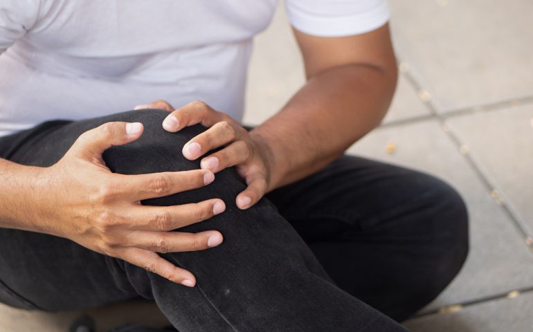 old man falling down, senior accident with knee injury