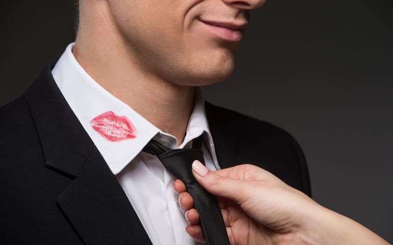 Treason. Man with lipstick on his collar