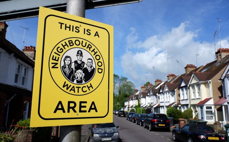 This is a Neighbourhood Watch Area sign in residential street