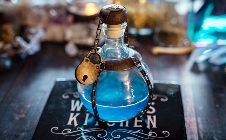 A magical blue elixir closed with a secret padlock.