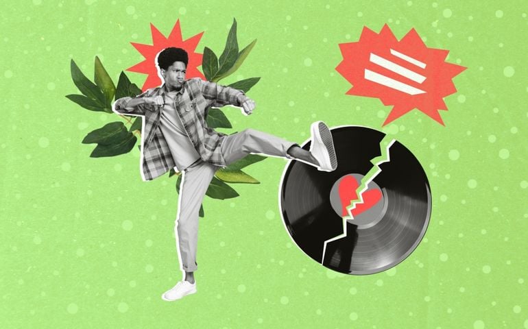 Photo picture of young aggressive funny guy kick leg broken vinyl disc heartbroken dramatic music aggression isolated on green background