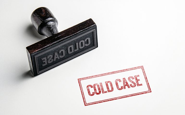 Rubber stamping that says 'Cold Case'.