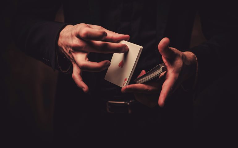 Man showing tricks with cards