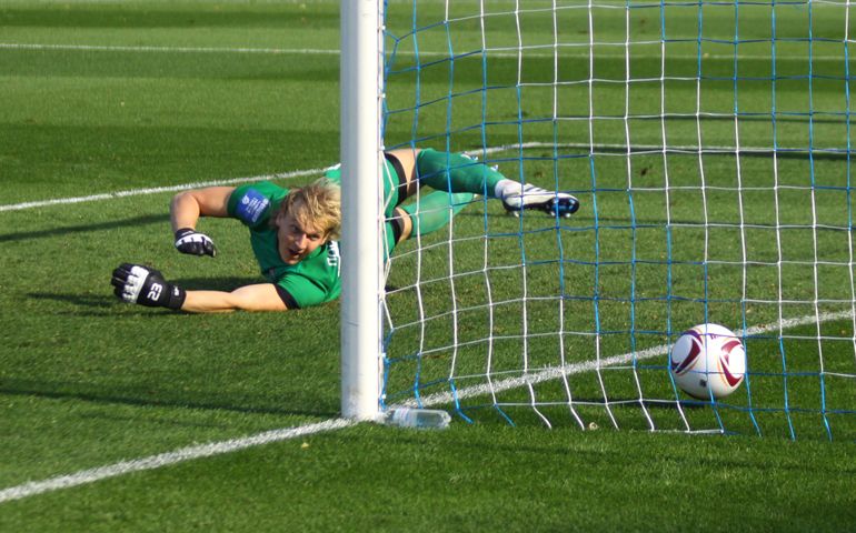 Arsenal Kyiv's goalkeeper Sergiy Pohorilyi missing a goal during Ukrainian Championship game against Dynamo Kyiv
