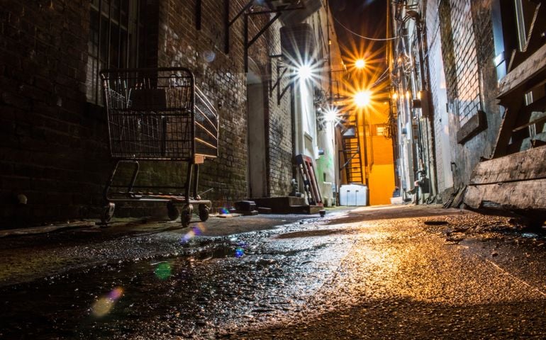 Abandoned urban alley at night