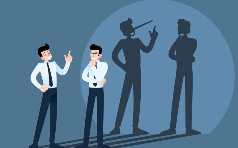 Happy smiling lies, cheat, hoax businessman character chatting in front of the wall with shadow of his long nose. Liar, lying people in business concept.