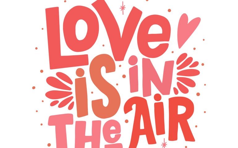 Love is in the air vector lettering clip art isolated on white background. Handwritten poster or greeting card. Valentine's Day typography.