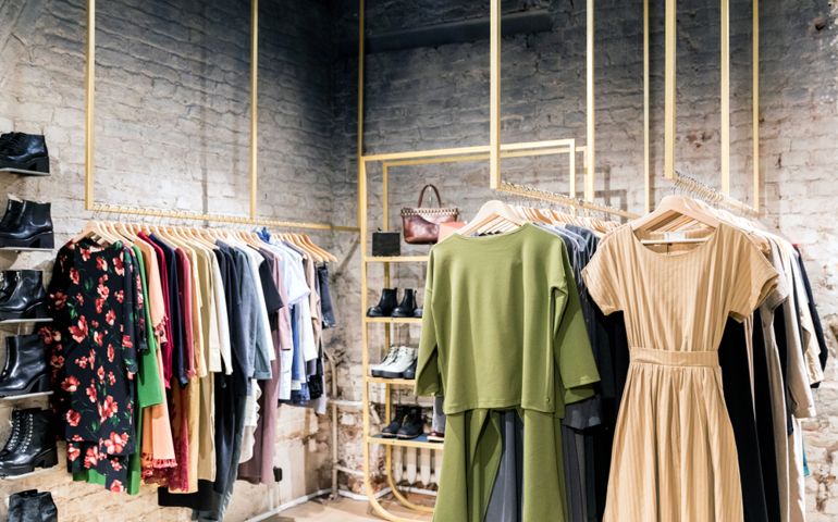 Fashion stylish luxury clothes display. Image and stylish services, selection of colors, types. Capsule spring wardrobe