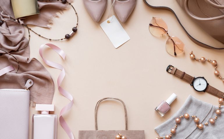 Fashion women stylish accessories outfit glamour set with label flat lay beige pastel background table with copy mock up space, female clothing offers shopping sale concept, above top view close up