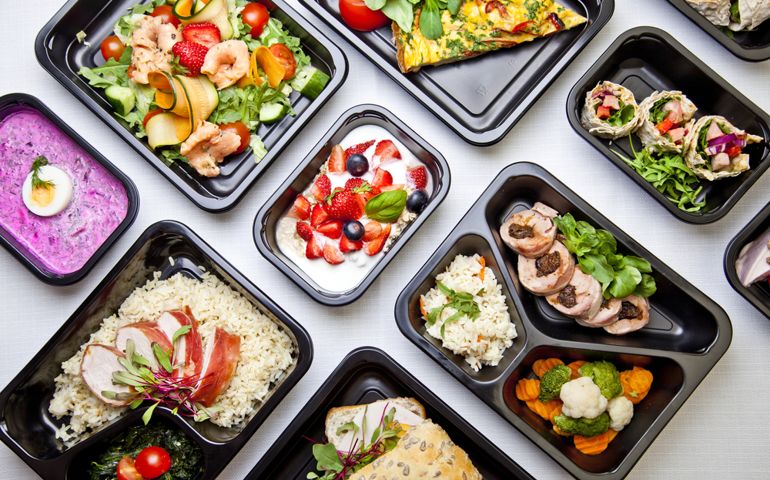 Catering food with healthy balanced diet delicious lunch box boxed take away deliver packed ready meal in black container dinner, meal, brakfast