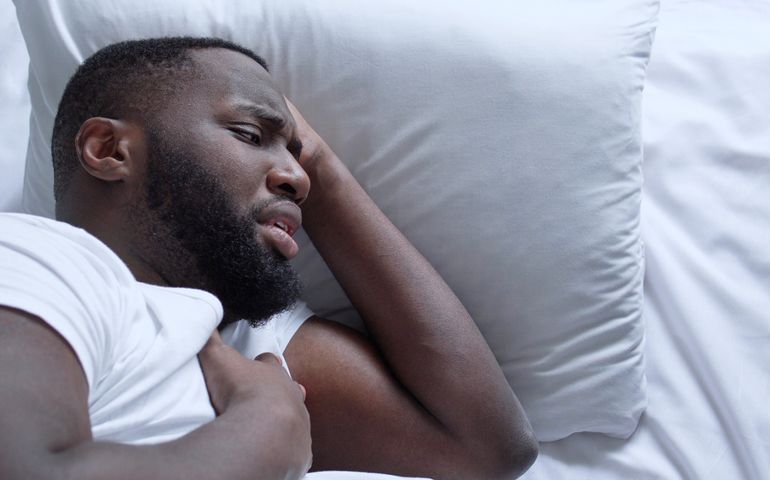 african american man waking up