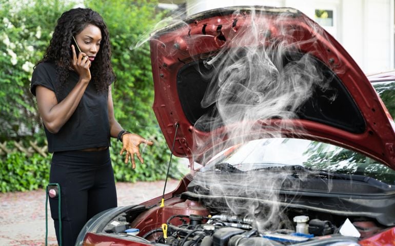 Woman Talking To Reliable Car Mechanic. Breakdown And Crash