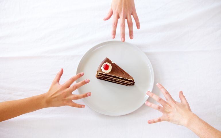 Mine. Three hands reaching for the last piece of cake.