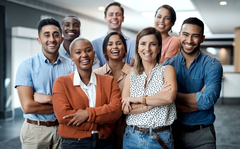 Diversity, portrait of happy colleagues and smile together in a office at their workplace. Team or collaboration, corporate workforce and excited or cheerful group of coworker faces, smiling at work