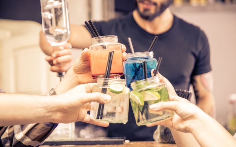 toast with cocktails glasses. concept about night life, alcohol, friendship, bartending, fun , and people