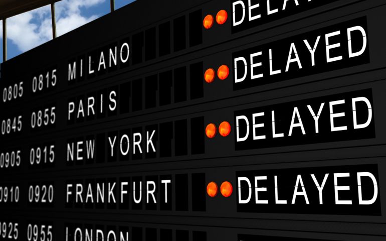 flight information board with delayed flights
