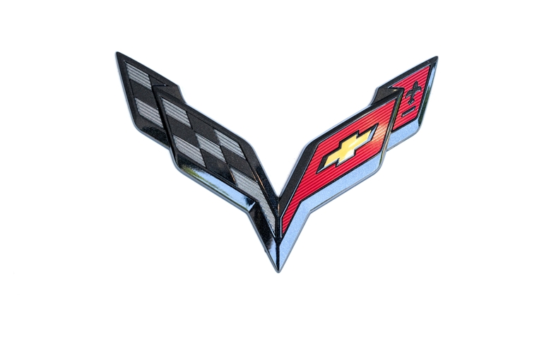 Chevrolet Corvette logo on a white car body
