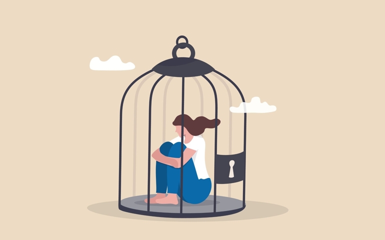 Stuck or trapped, fixed mindset or metal illness problem, anxiety or depression, solitude and loneliness, fear to get outside concept, depressed woman lock herself sit inside birdcage.