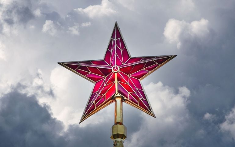 Moscow Kremlin red ruby star in the dark stormy sky