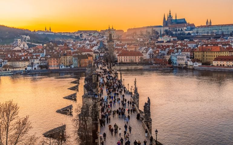 View of the city of Prague castle in hradcany and the Vltava river with Charles bridge from Old Town Bridge Tower in Prague, Czech Republic