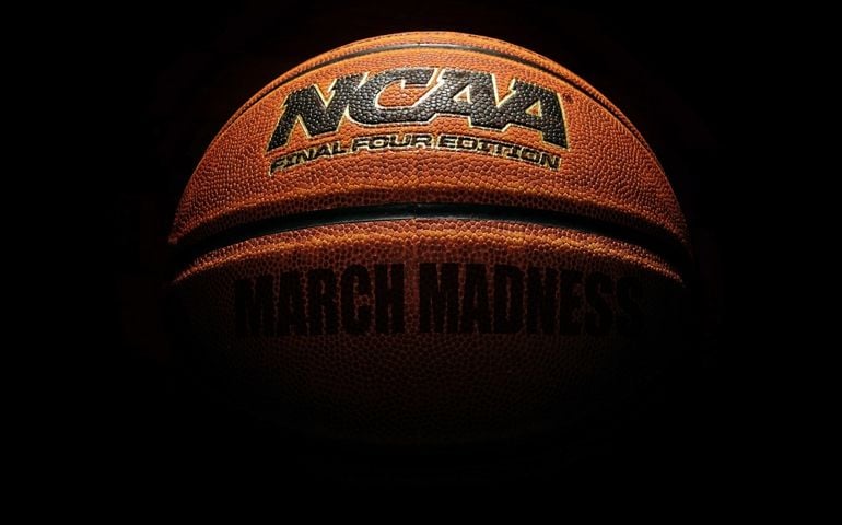 An NCAA Final Four Edition March Madness basketball on dark background